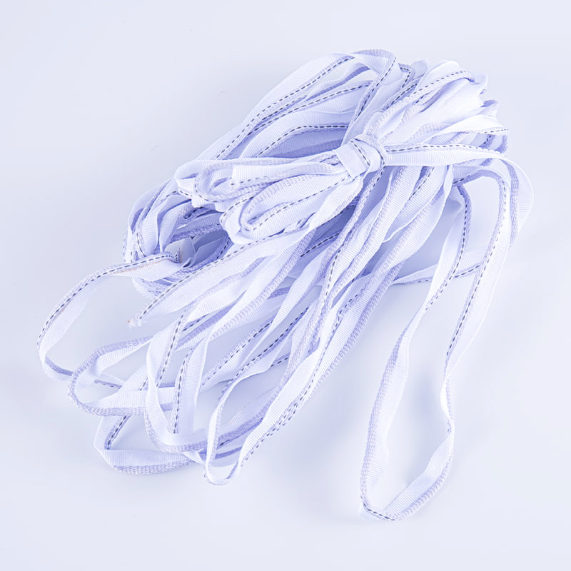 1,0 cm-es nagy sűrűségű poliészter fényvisszaverő szalag kompressziós kopásálló ruházati kiegészítőkhöz